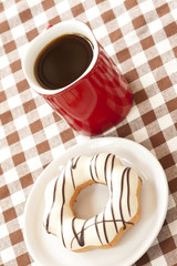 Donut and red coffee cup