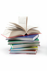 A stack of books on a white background.