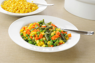 Serving dishes of vegetables