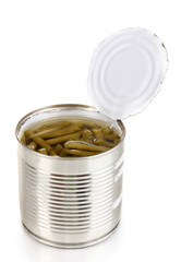 Open tin can of french bean with spoon isolated on white