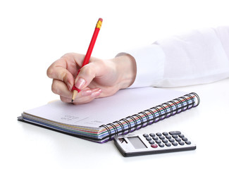 women hands with pencil, notebook and Calculator isolated