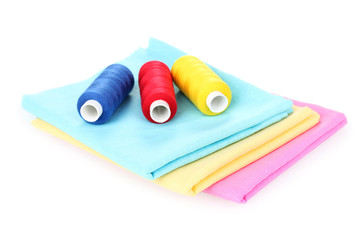 Sewing accessories and fabric isolated on white