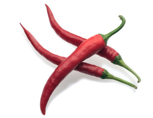 Three chili peppers isolated on white background