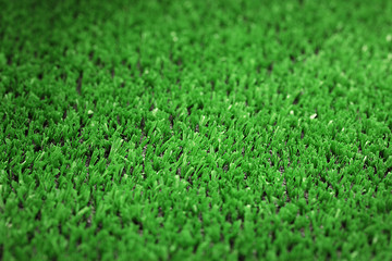 backgrounnd of artificial green grass