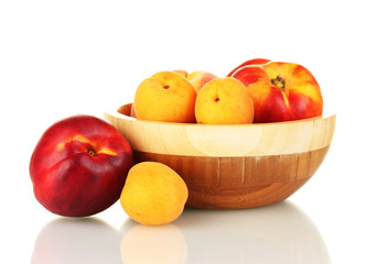 Fototapeta na wymiar Ripe fruit in bowl isolated on white