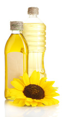 oil in jars and sunflower, isolated on white