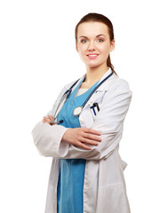 Fototapeta premium Happy young nurse standing with folded arms