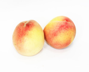 two peaches on white background
