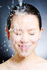 young beautiful attractive woman taking shower