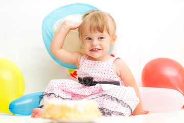 Little girl celebrating second birthday