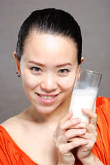 Young Woman with a glass of milk