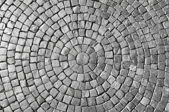 Texture of cobblestone in old town.