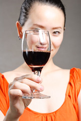 The girl in the open red wine