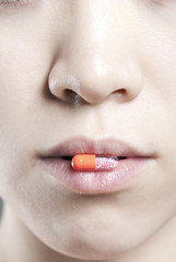 Obraz premium A female oral a medicine