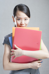 bright picture of beautiful woman with folders