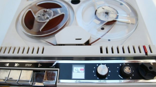 vintage tape recorder playing an original speech from sixties