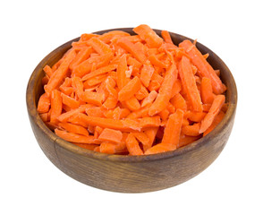 Shredded carrots in old wood bowl