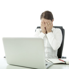 young beautiful brunette woman is depressed on desk