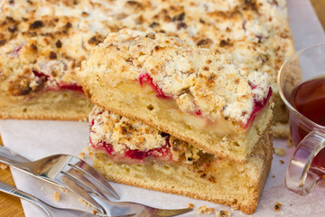 Delicious cake with apples and raspberries
