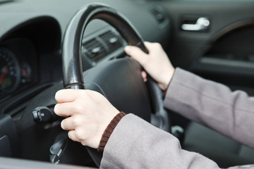 Right hands position on steering wheel during driving a car