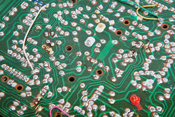 Circuit board super close-up toned in green color