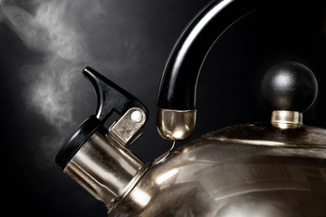 Tea kettle with boiling water