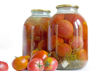 Preserved red tomatoes in a glass jar