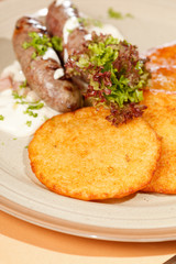potato pancakes with sausages
