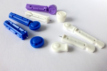 Various lancets for glucose meter lancing devices