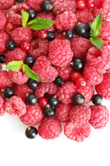ripe berries with mint, isolated on white.