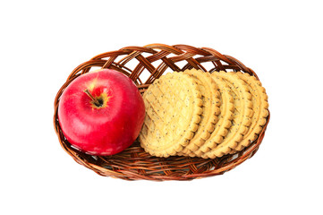 apples and biscuit in basket
