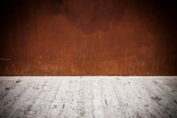 rusty metal plate background with concrete floor