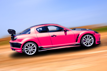 Plakat Różowy samochód sportowy