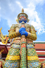 Fototapeta na wymiar Giant statue at the gate in Wat Phra Kaew