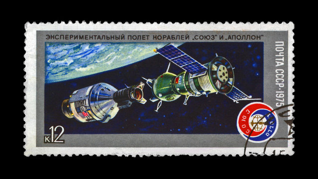 Soyuz, Apollo spaceship experimental flight,circa 1975. manned space flight near Earth Planet. Apollo-Soyuz Test Project as 1st joint flight of the USA and USSR. Stamp printed in USSR (Russia). - Powered by Adobe