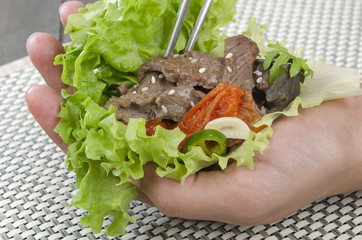 Bulgogi Wrap  - Korean BBQ beef with kimchi, ssamjang, & lettuce