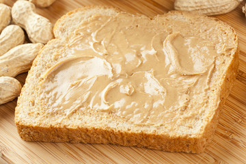 Obraz na płótnie Canvas Creamy Brown Peanut Butter