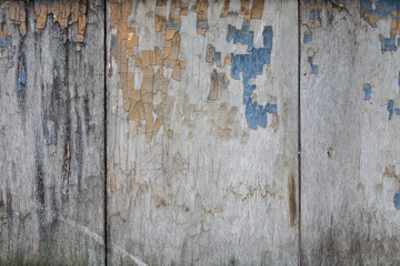 ragged paint on wooden planks