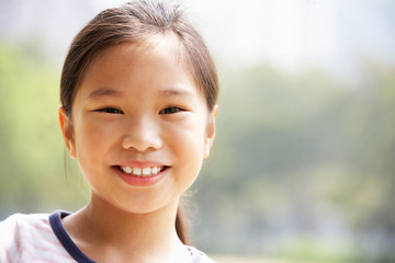 Head And Shoulders Portrait Of Chinese Girl