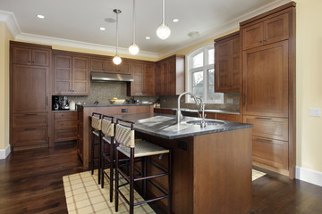 Kitchen with oak wood cabinetry