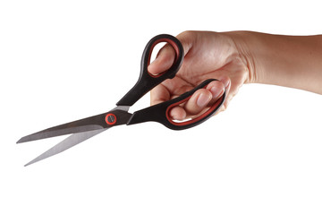 Scissors in hand isolated on white