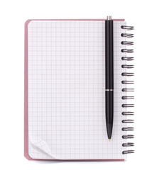 Open blank checked notebook with black pen