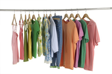 Variety of casual colorful shirts on hangers