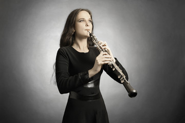 Classical musician oboe playing - obrazy, fototapety, plakaty