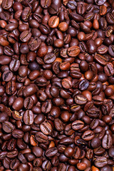 Background with many roasted coffee beans