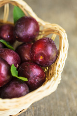 Plums on table