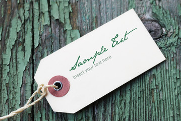 Blank Label on a Green Wooden Background