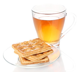 Cup of tea and cookies isolated on white