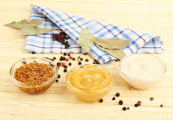 various sauces on bamboo mat
