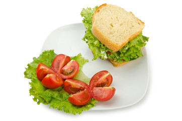 Tomatoes and cucumbers on white